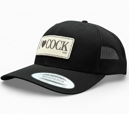 Black trucker cap with a patch and snapback label on a white background