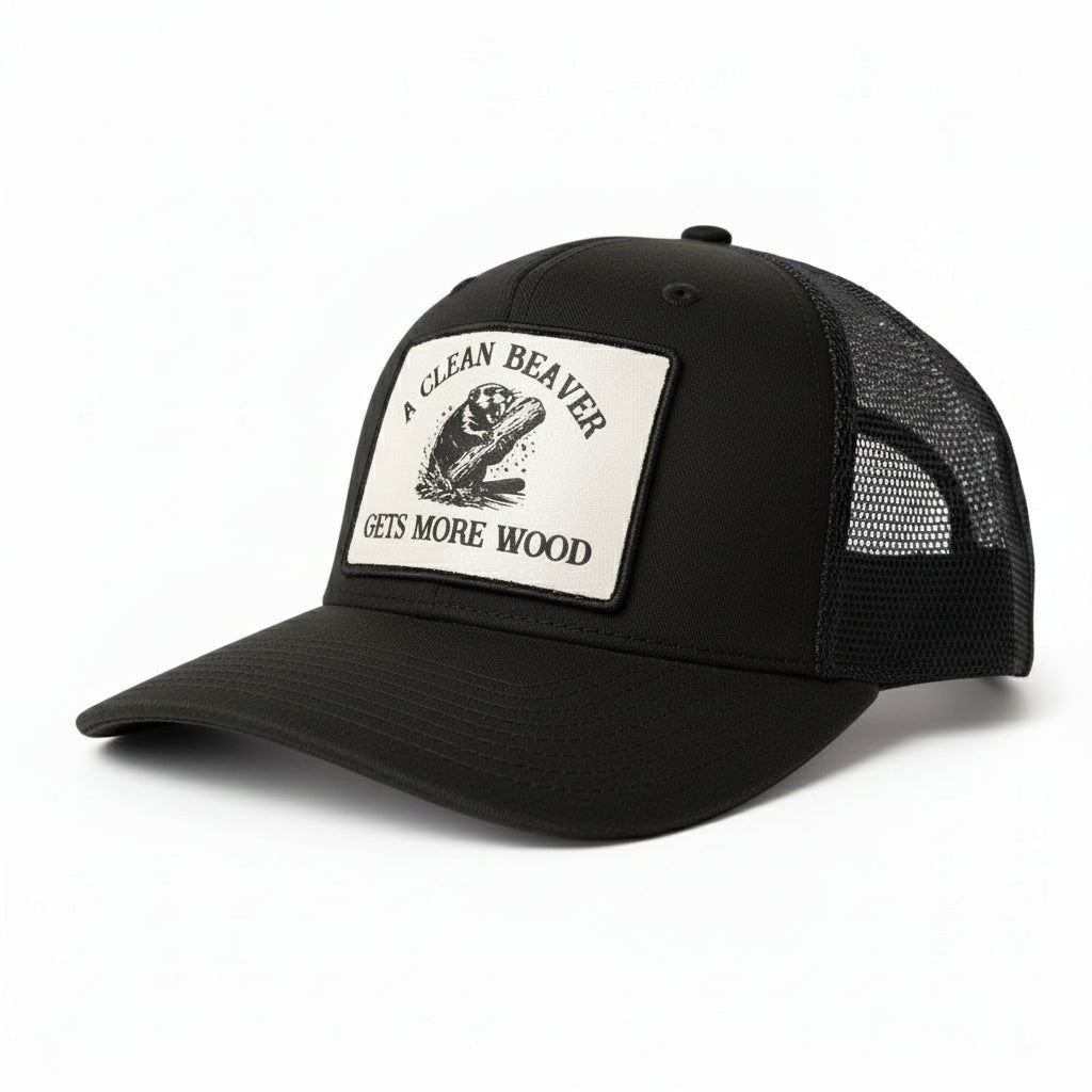 Black trucker cap with a white patch featuring a beaver and text on a white background