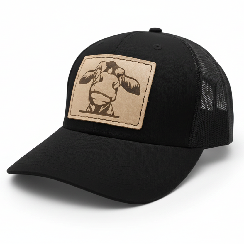 cow leather hat patch sewn onto a black hat