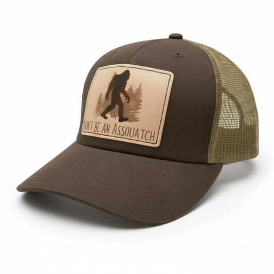 Brown and beige cap with a Sasquatch logo on a white background