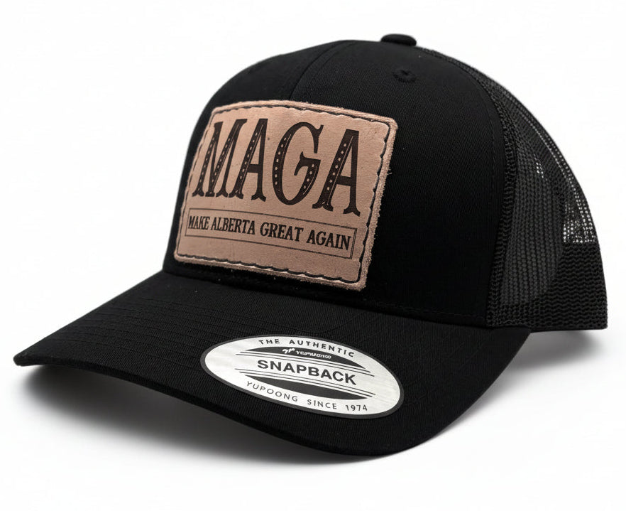 Black trucker cap with a brown patch and 'MAGA' text on a white background