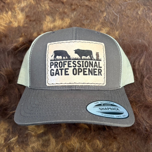 Gray cap with 'Professional Gate Opener' patch on a brown fur background