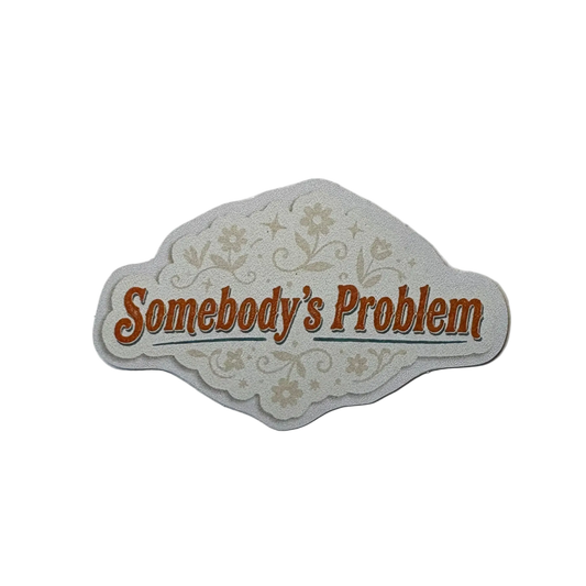 Decorative sign with 'Somebody's Problem' text on a white background