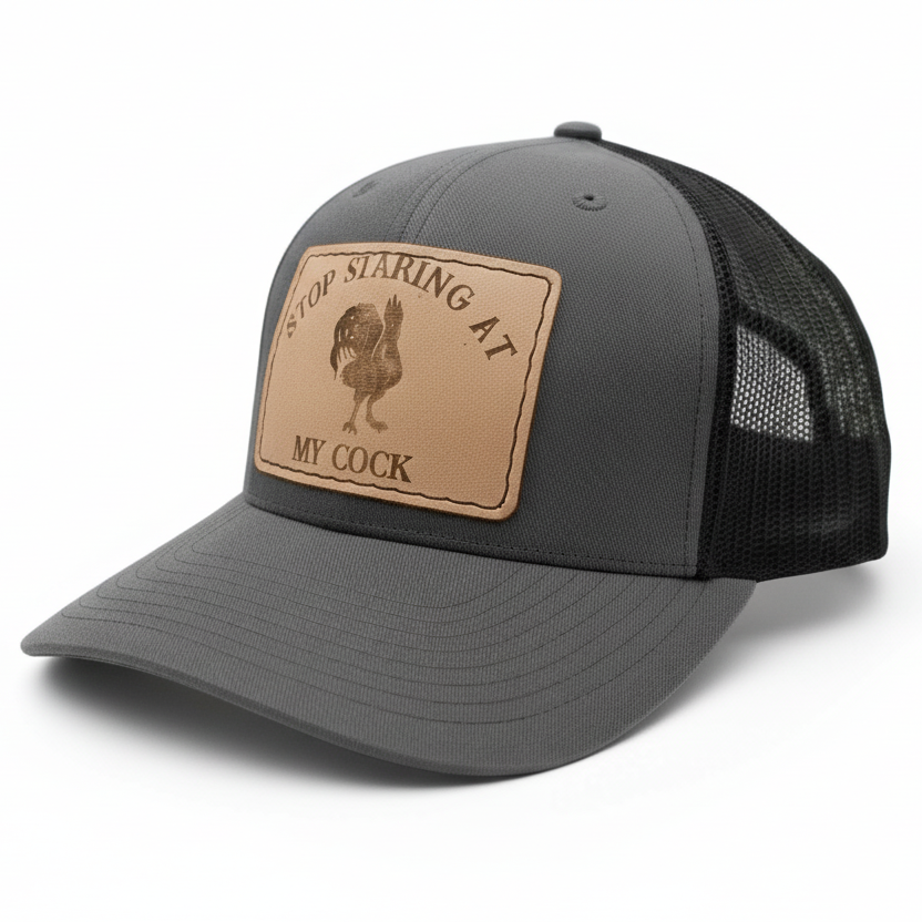 Gray and black cap with a leather patch on a white background