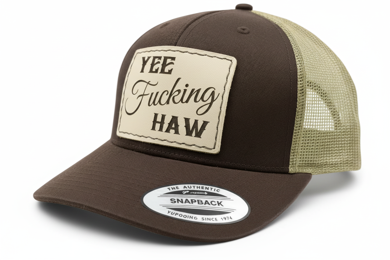 brown and tan hat with a leather patch that says yee fucking haw